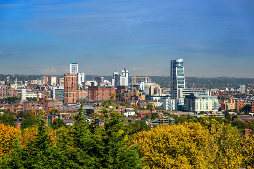 A city with a park nearby for local living