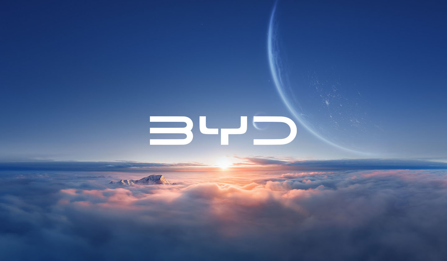 BYD logo over surreal brand skyscape