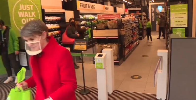 Woman leaving a shop after an Amazon experience